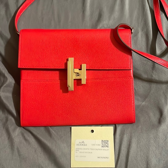 Hermes Handbags - Hermes!! Hermes cinhetic Togo calfskin wallet bag . Red (new)